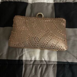 Pretty gold evening bag.  Like new-  clean.